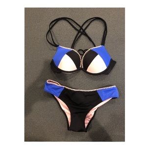 Blue, pink, and black bathing suit